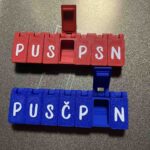 Kutija za lijekove s preklopnim poklopcima i oznakama dana u tjednu